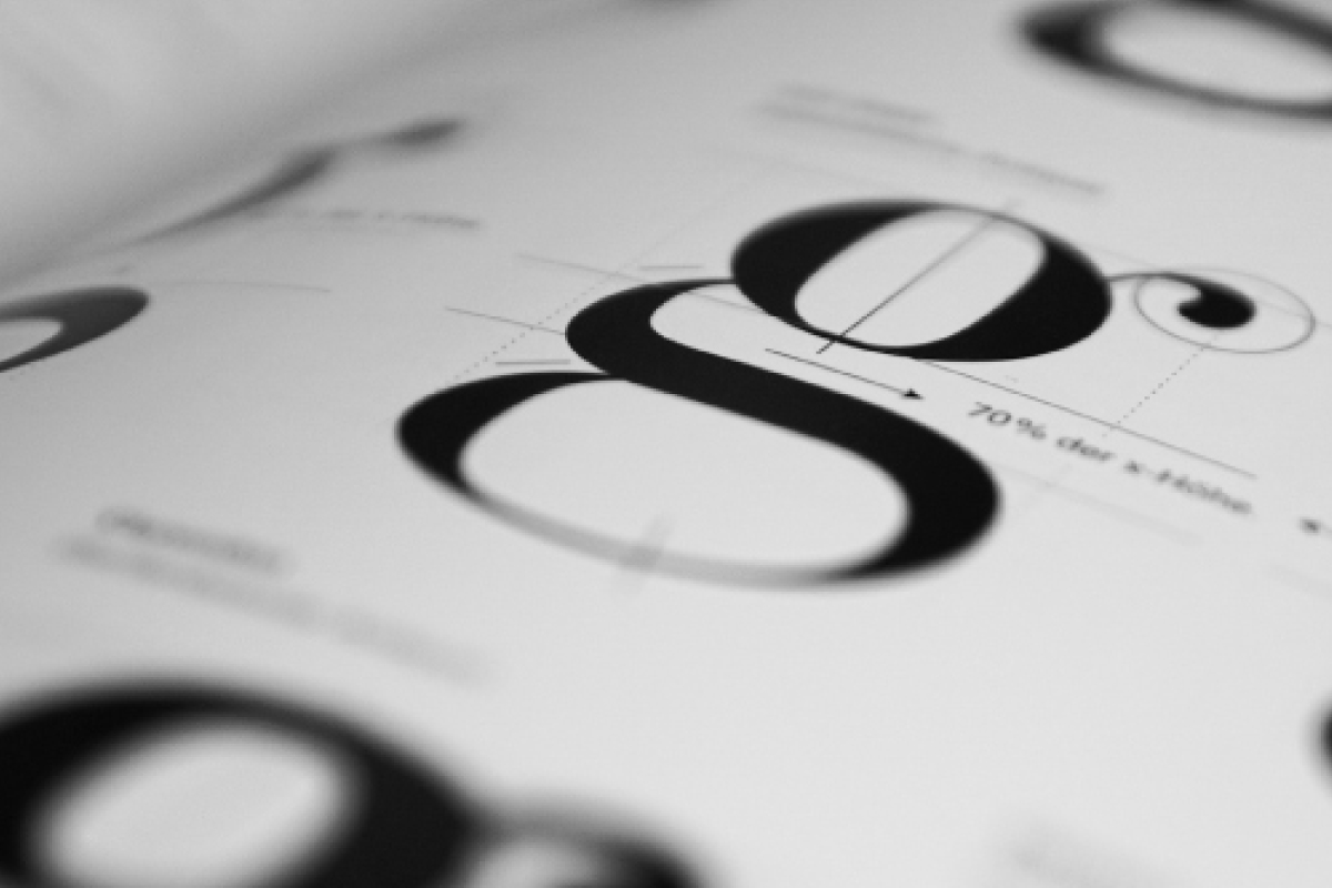 Close Up of Typography Book, Showing a Lowercase Letter G