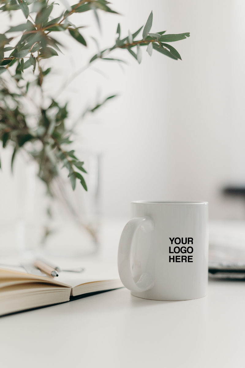 Promotional Item White Mug with "Your Logo Here" Text on It