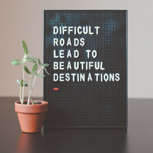 Letter Board with "Difficult Roads Lead to Beautiful Destinations"