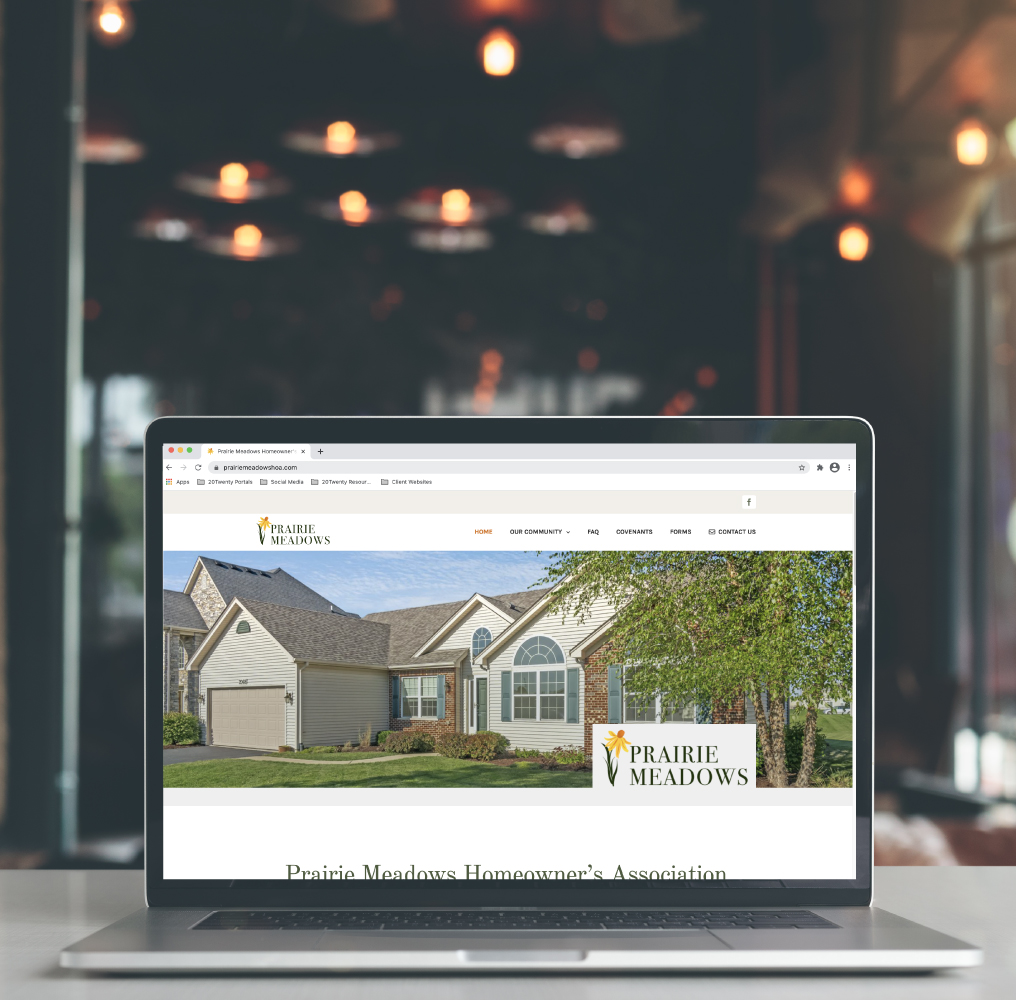 Prairie Meadows HOA Website Design on Laptop