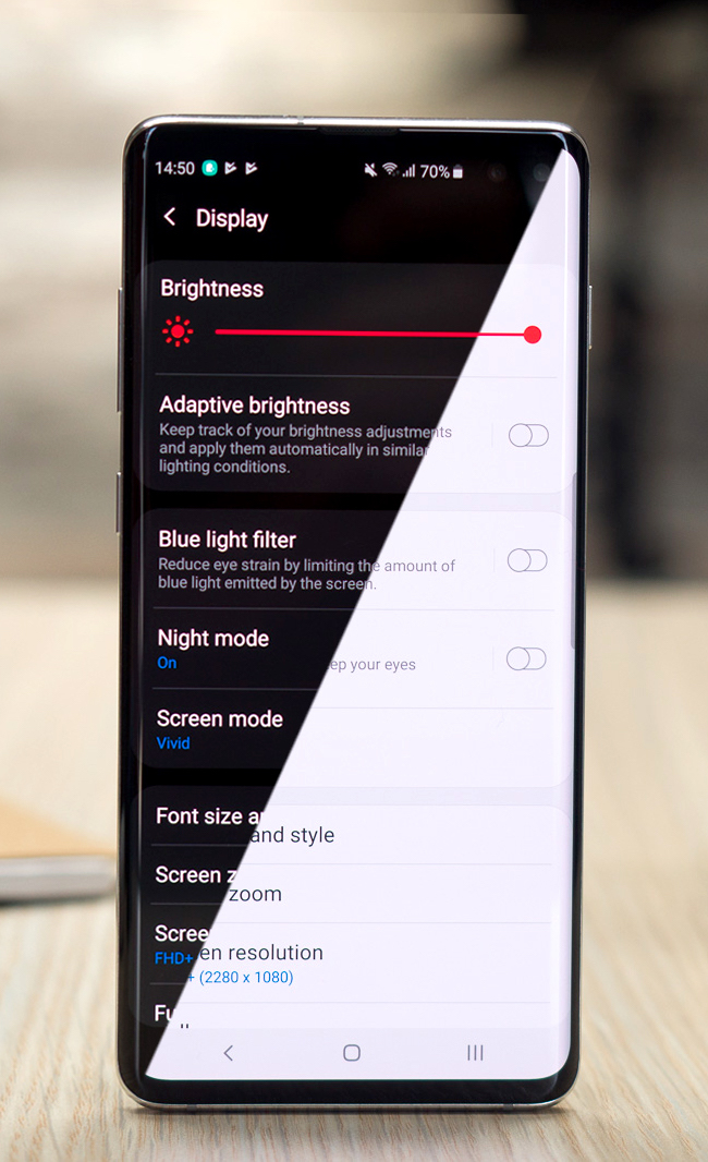 Cell Phone with Split Screen Featuring Dark Mode and Light Mode