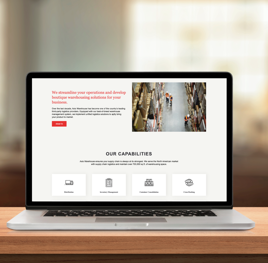 Axis Warehouse Website on Laptop Screen