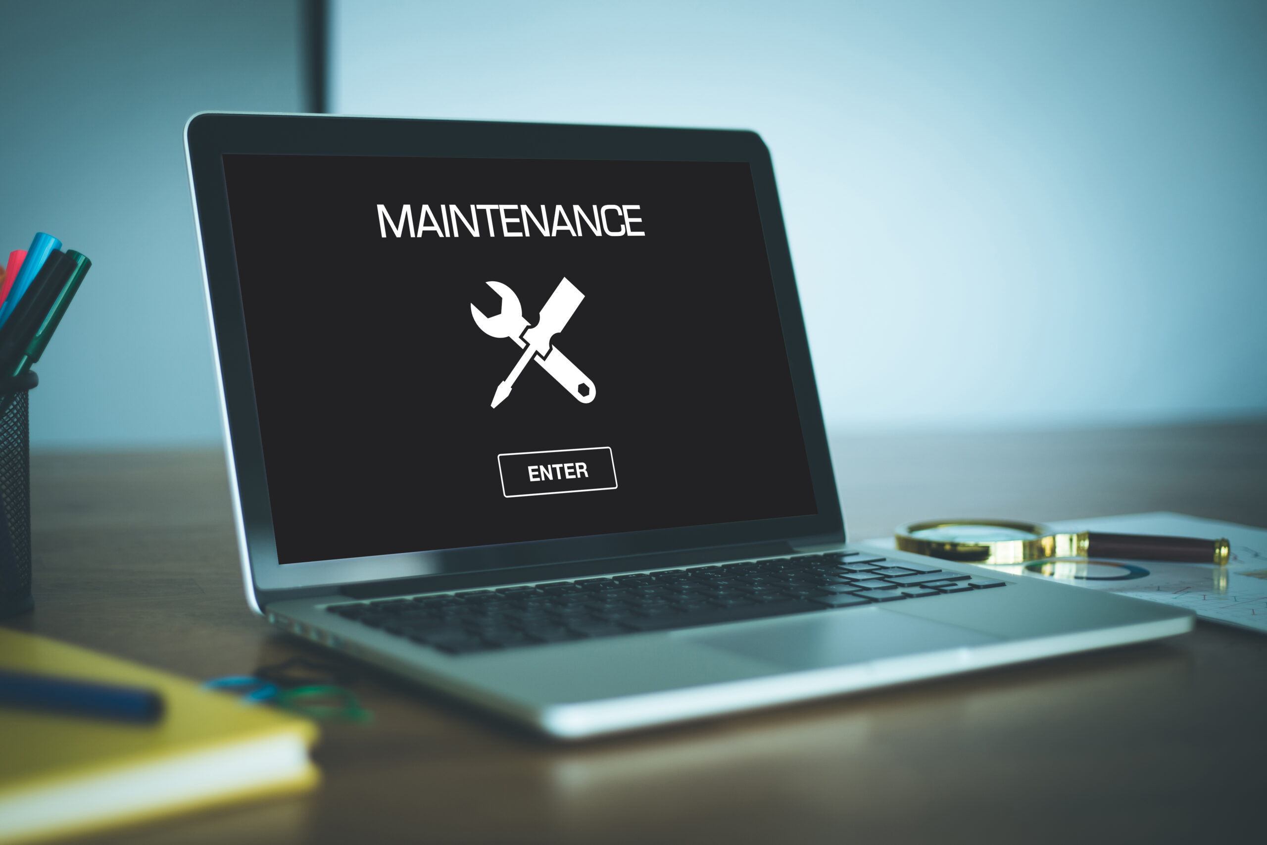 Website Maintenance Screen on Laptop