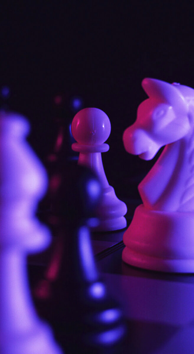 Chess pieces with purple lighting